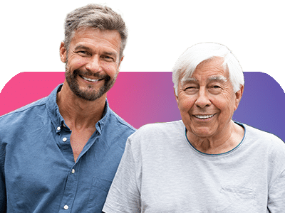 Care assistant and older gentleman smiling because they like their healthcare recruitment agency